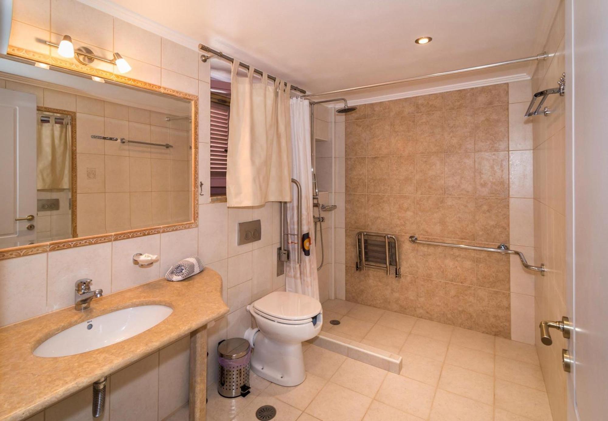 Athena'S Cottage Stoupa Bagian luar foto